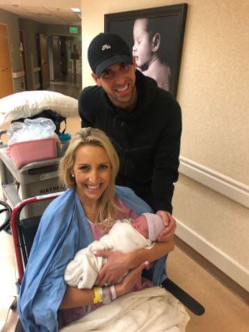 Hayley Dulin Saunders with her husband Ryan Saunders and newly born son Lucas Philip Saunders.